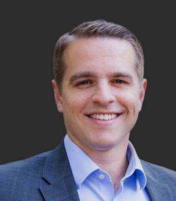 Portrait of Tyler Peters, Realtor®/Vice President.